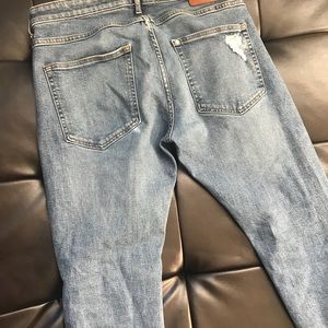 H&M’s distressed skinny jeans.